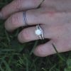 Blue-sapphire-channe-hand-engraved-band.jpg