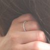 Delicate-single-shared-prong-diamond-wedding-ring-OroSpot.jpg