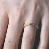 Intertwined-Hand-Engraved-Gold-Wedding-Ring.jpg