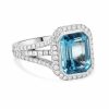 Modern-halo-blue-topaz-diamond-ring.jpg