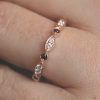 Pave-diamond-and-garnet-wedding-ring.jpg