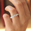 Round-forever-one-moissanite-eternity-wedding-ring-by-OroSpot.jpg