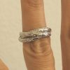 Triple-rolling-ring-in-platinum-by-OroSpot.jpg