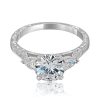 Vintage-3-stone-ring-with-side-pearshapes.jpg