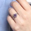bezel-non-traditional-engagement-ring-with-amethyst-and-side-diamonds-OroSpot.jpg