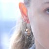 gold-bear-earrings-on-a-model.jpg