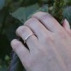 rhree-diamonds-thin-modern-wedding-band.jpg